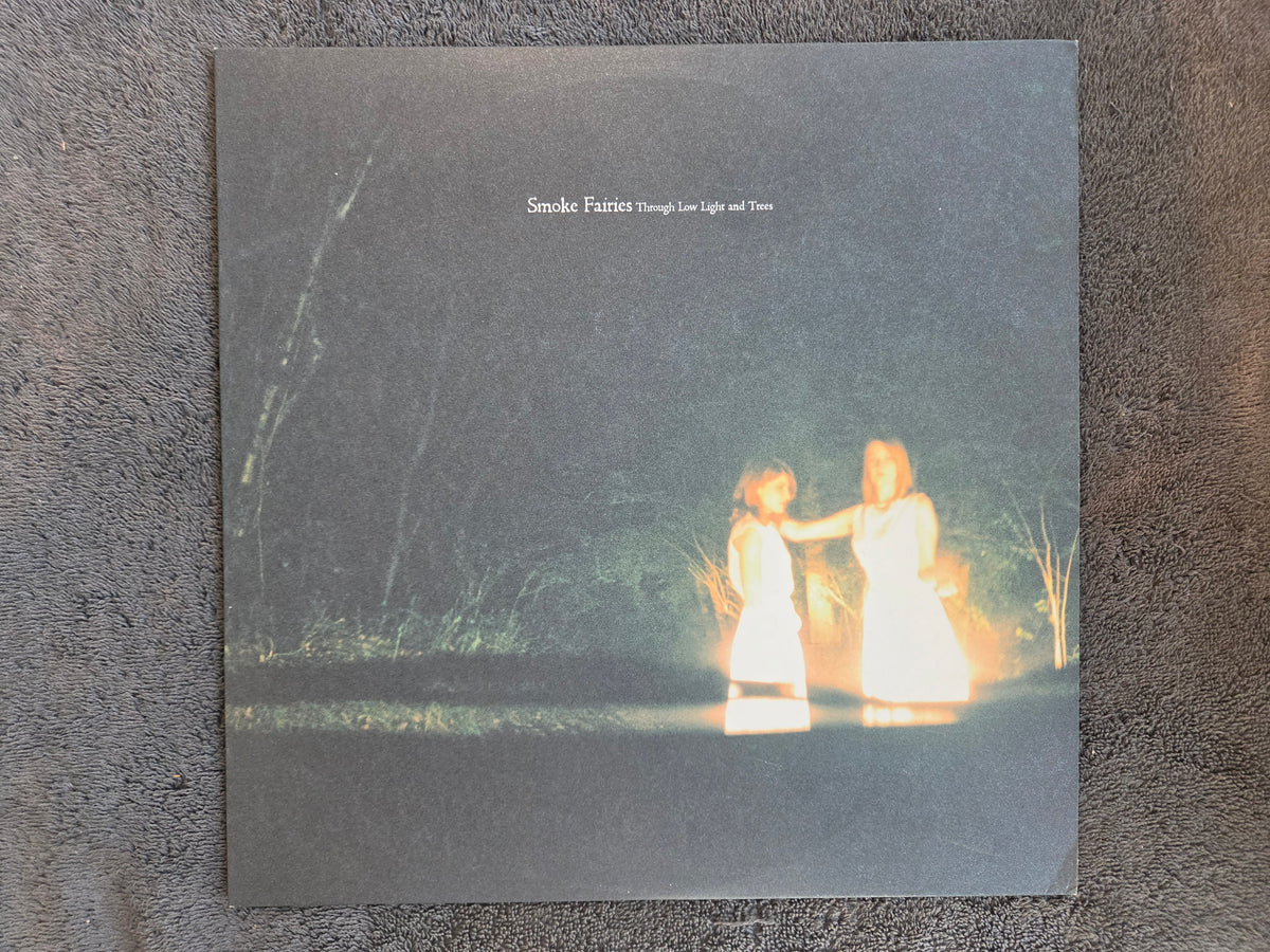 SMOKE FAIRIES THROUGH LOW LIGHT AND TREES