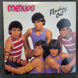 MENUDO REACHING OUT