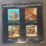 CCR TRAVELIN BAND WHOLL STOP THE RAIN PS 7"