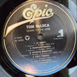 TOM DE LUCA DOWN TO THE WIRE