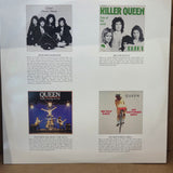 QUEEN GREATEST HITS RED ORANGE SWIRL
