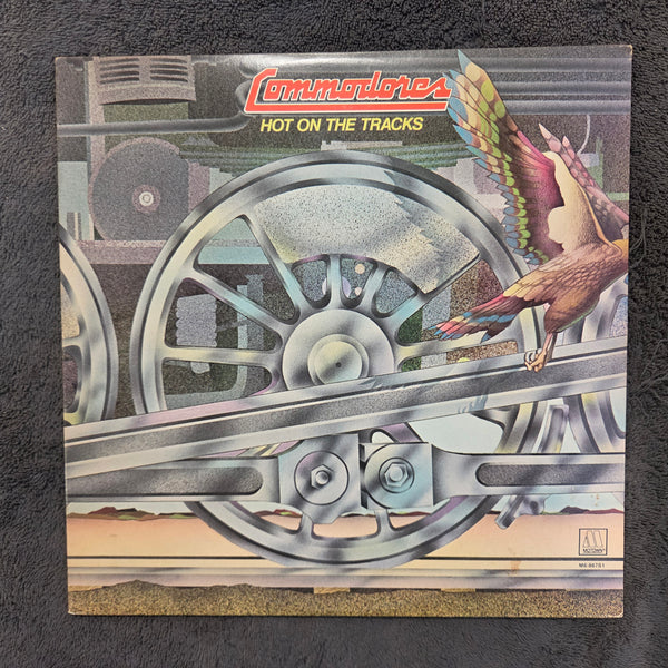 COMMODORES HOT ON THE TRACKS