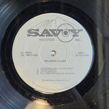 MILDRED CLARK AND THE MELODY AIRES TELL IT