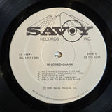 MILDRED CLARK AND THE MELODY AIRES TELL IT