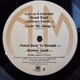 HEAD EAST FLAT AS A PANCAKE