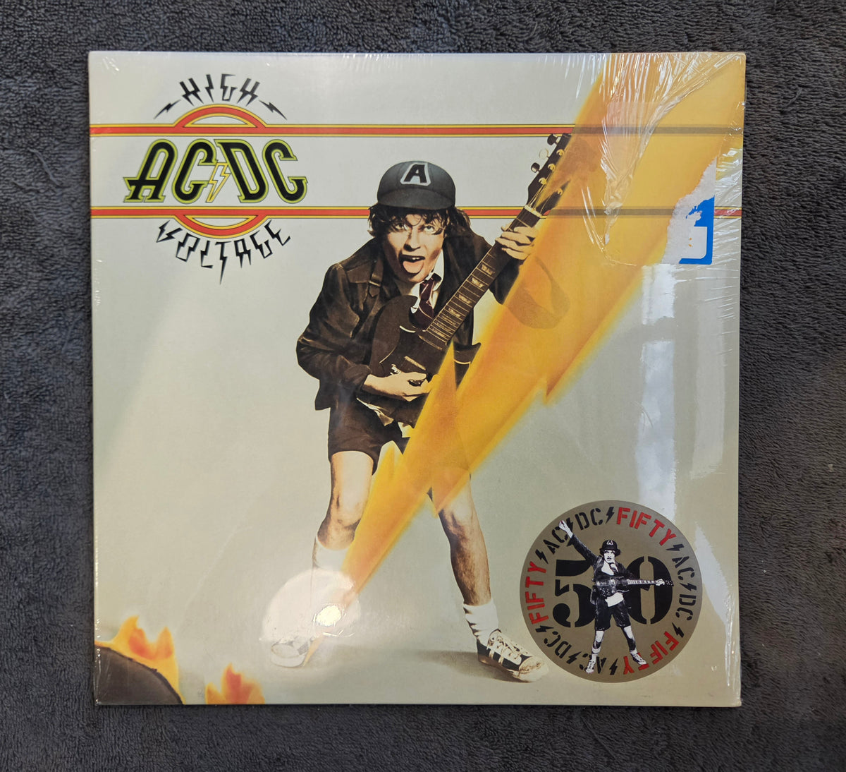 AC/DC HIGH VOLTAGE 5OTH ANNIV GOLD NEW