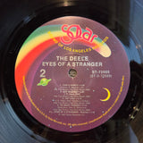 DEELE EYES OF A STRANGER