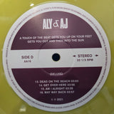 ALY & AJ A TOUCH OF THE BEAT GETS YOU UP ON YOUR FEET YELLOW