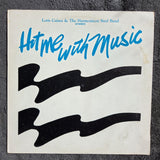 LORIS CAINES & THE HARMONICON STEEL BAND HIT ME WITH MUSIC