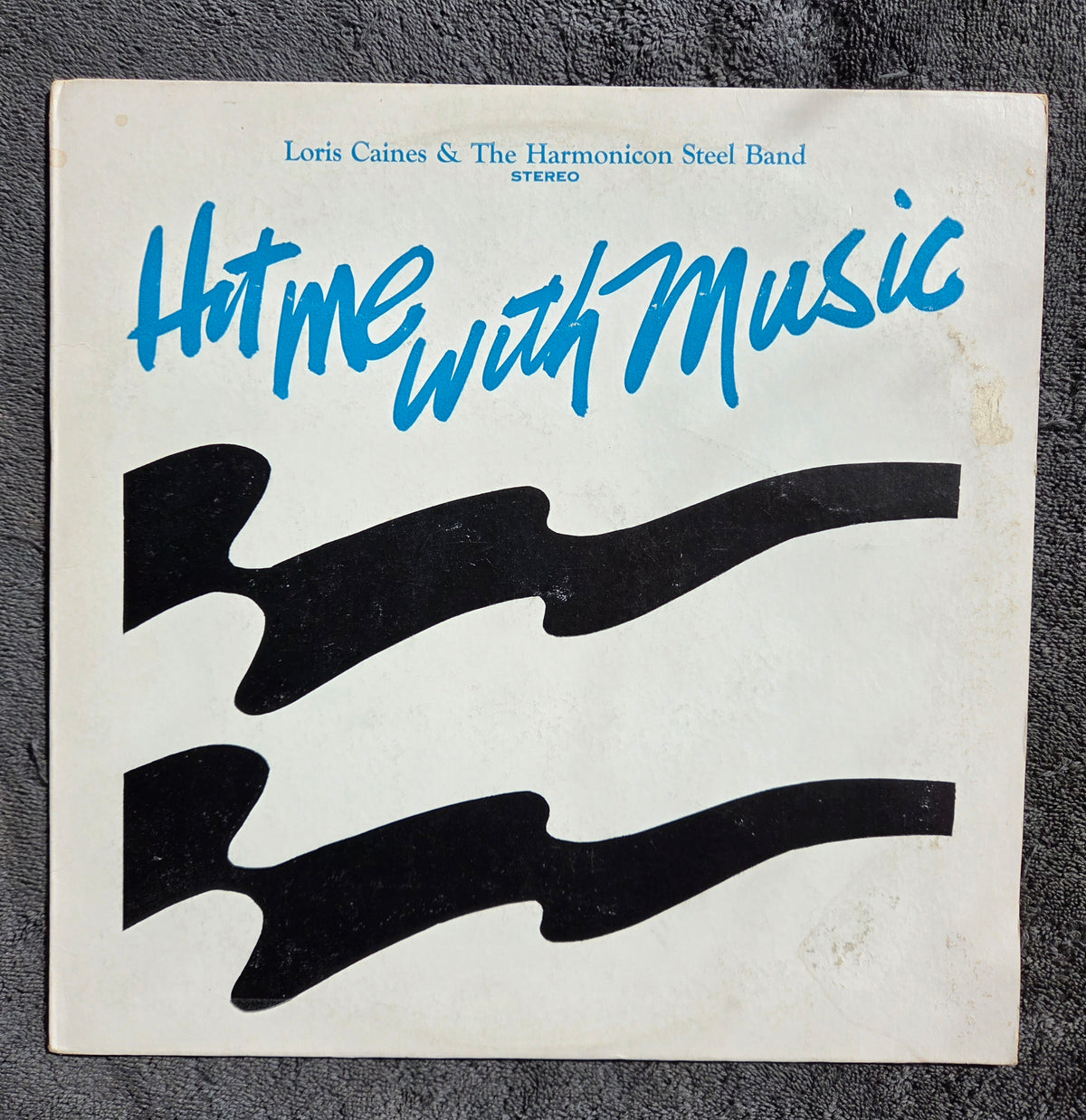 LORIS CAINES & THE HARMONICON STEEL BAND HIT ME WITH MUSIC