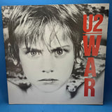 U2 WAR 1P LIGHT BLUE LABEL