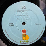 U2 WAR 1P LIGHT BLUE LABEL