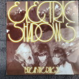 ELECTRIC SHADOWS BREAK THE RULES SHE'S ALL YOU GOT ORANGE VINYL PS