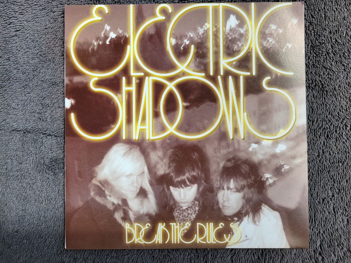 ELECTRIC SHADOWS BREAK THE RULES SHE'S ALL YOU GOT ORANGE VINYL PS
