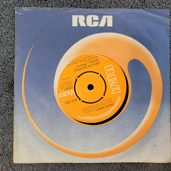 DAVID BOWIE DRIVE IN SATURDAY ROUND AND ROUND 4 PRONG CENTER HOLE UK IMPORT