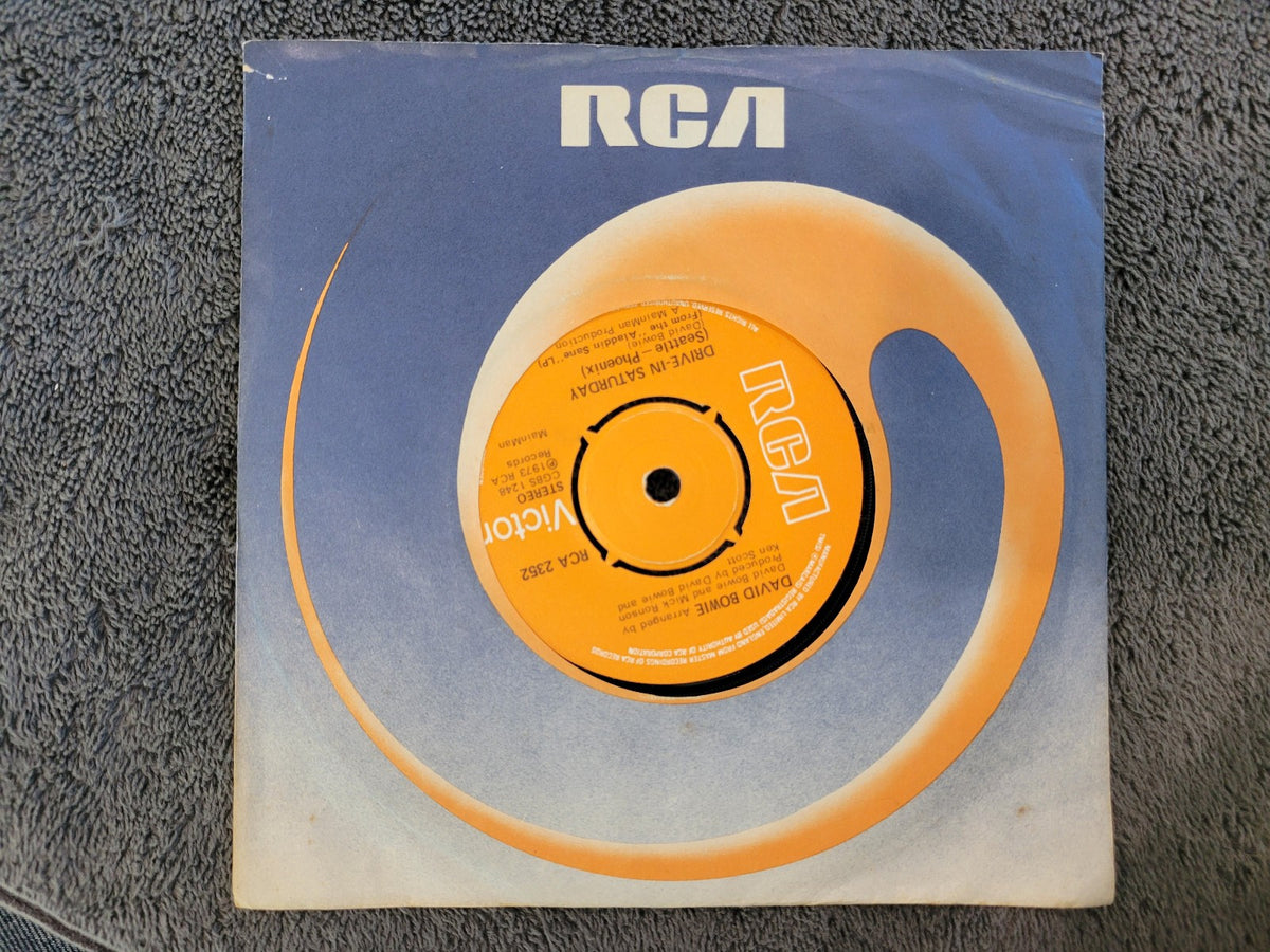 DAVID BOWIE DRIVE IN SATURDAY ROUND AND ROUND 4 PRONG CENTER HOLE UK IMPORT