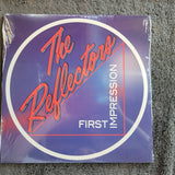 REFLECTORS FIRST IMPRESSION NEW SEALED