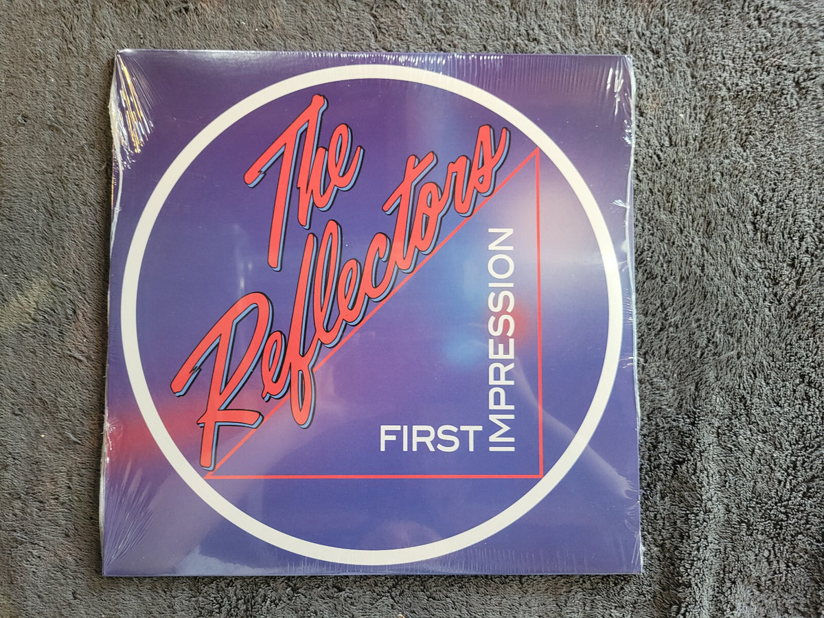 REFLECTORS FIRST IMPRESSION NEW SEALED
