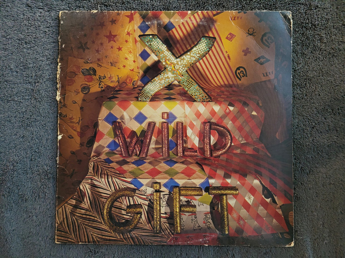 X WILD GIFT FIRST PRESSING SLASH RECORDS