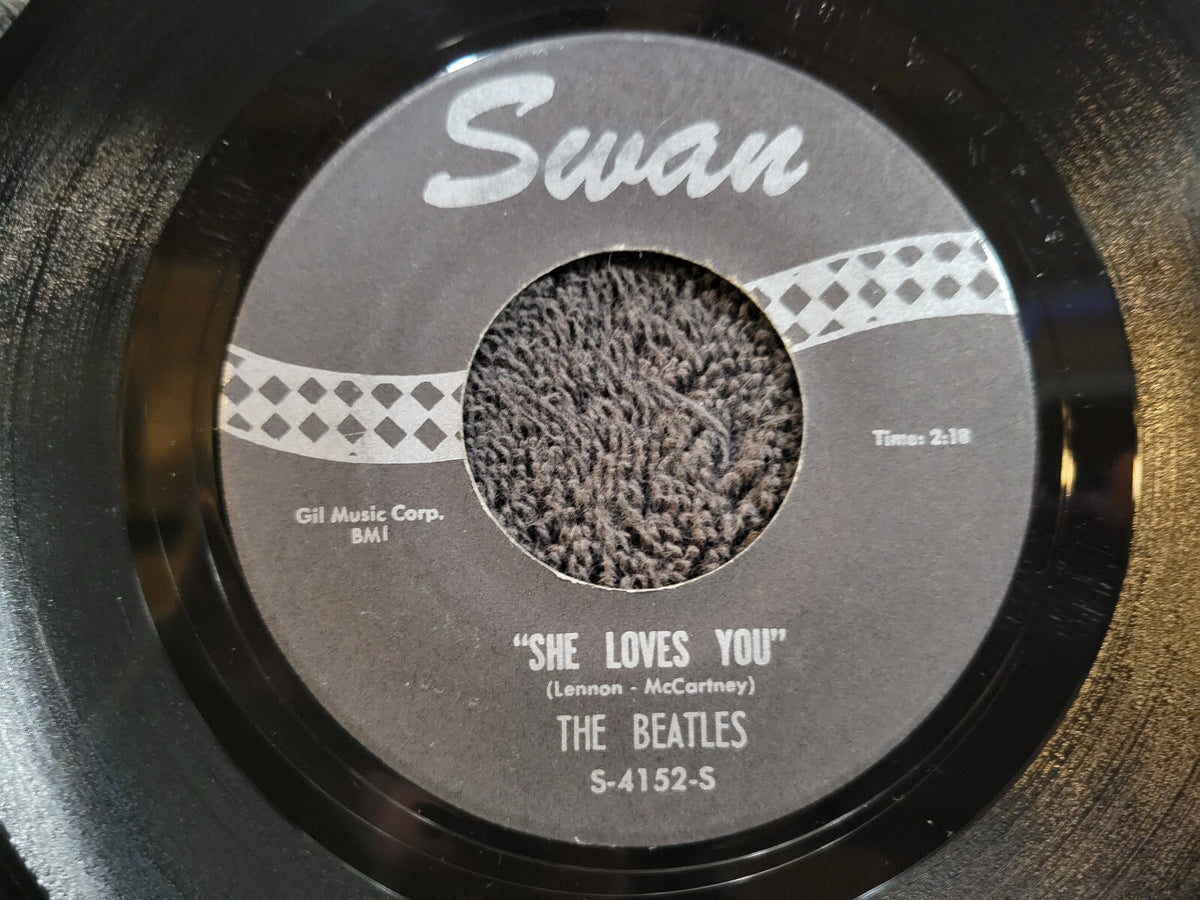 BEATLES SHE LOVES YOU ILL GET YOU SWAN